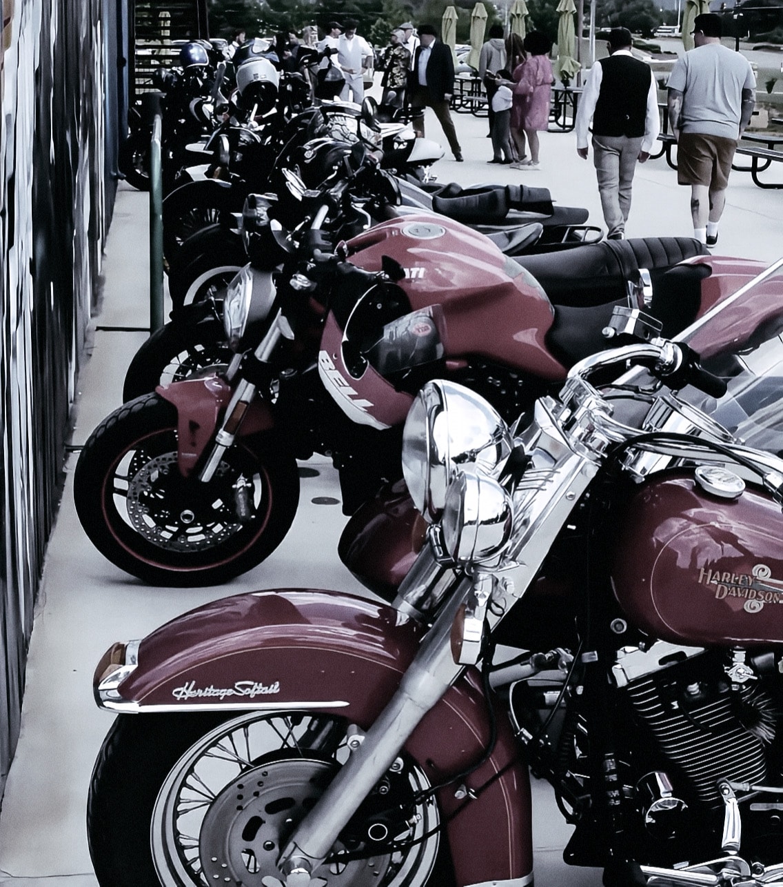 Distinguished Gentleman's Ride — Harleys and bikes along the wall