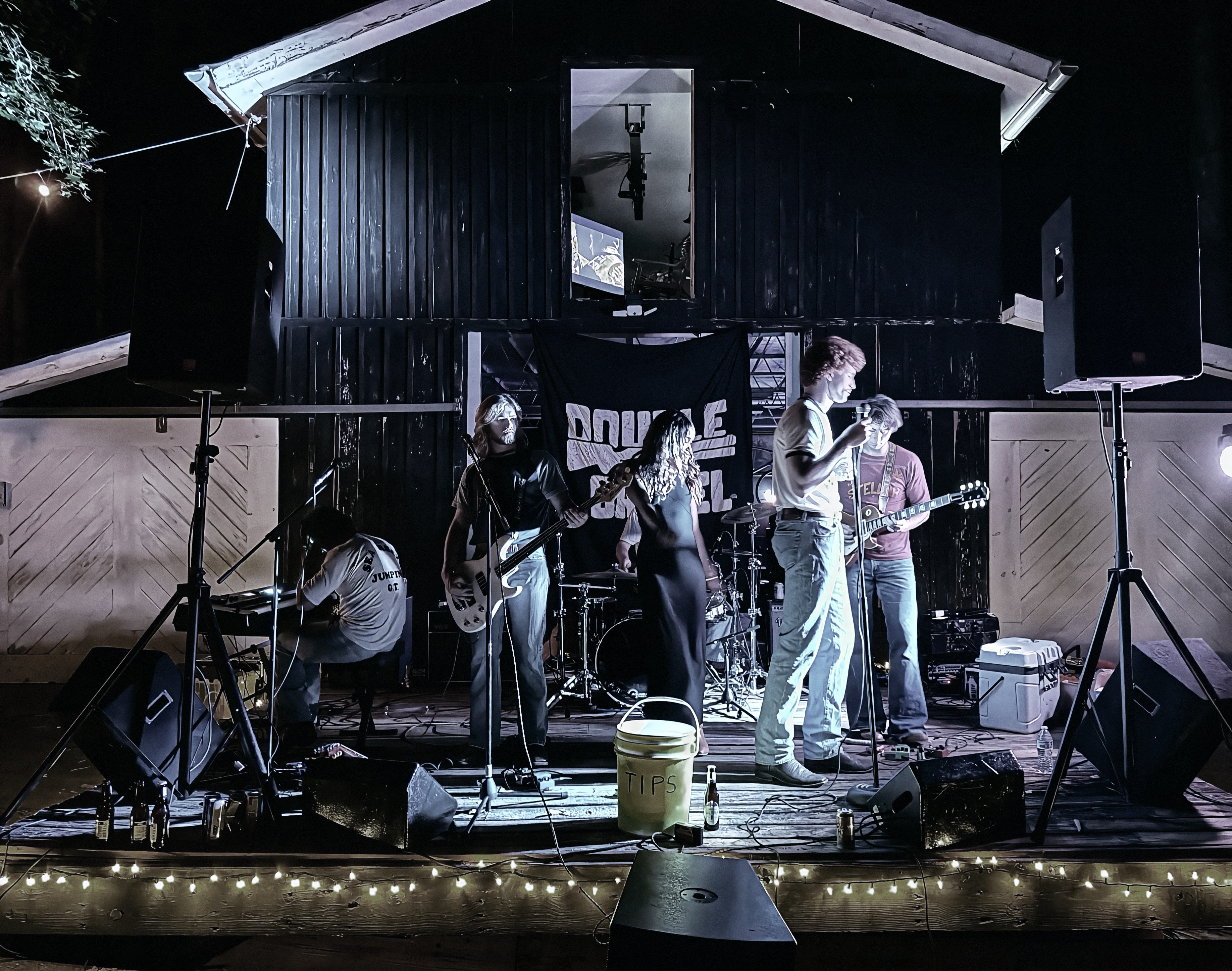 At Dug Hill — live band performing at night on the outdoor stage